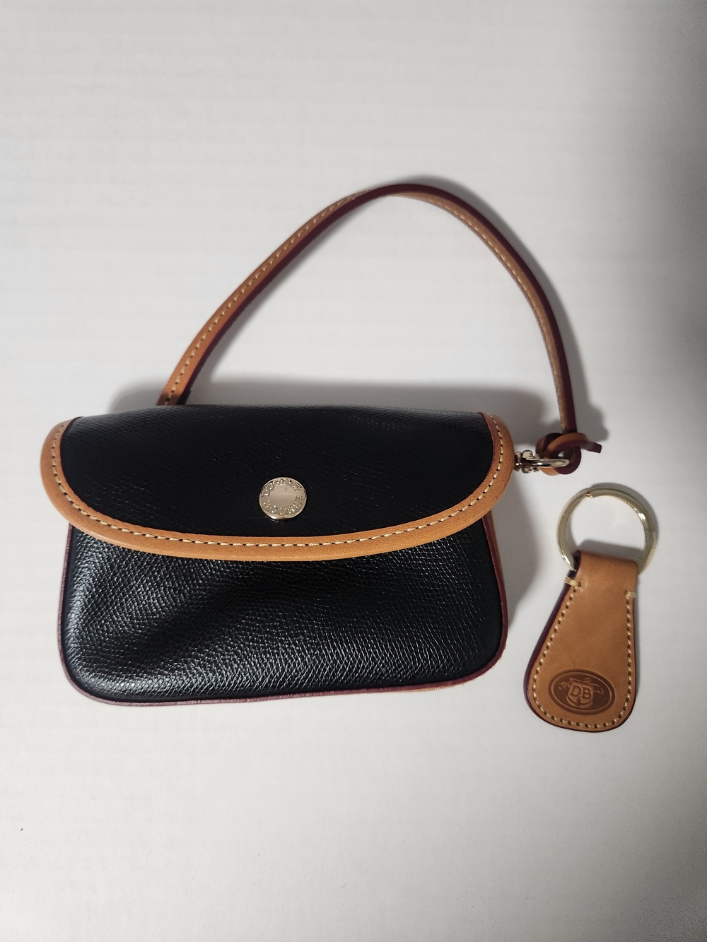 Dooney & Bourke Black and Tan Leather Wristlet with Keychain